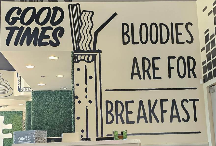 Wall sign reading Good Times, Bloodies Are For Breakfast