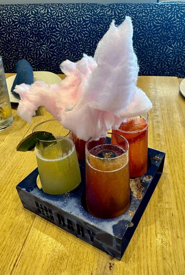 Mimosa flight topped with cotton candy