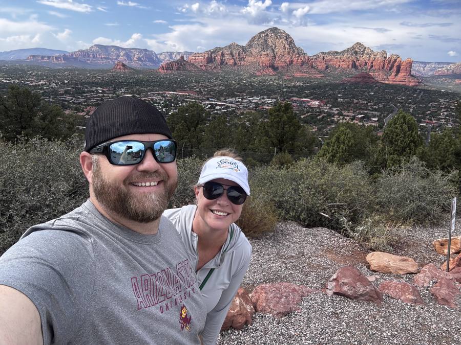 Matt and Jessica selfie with red rocks behind